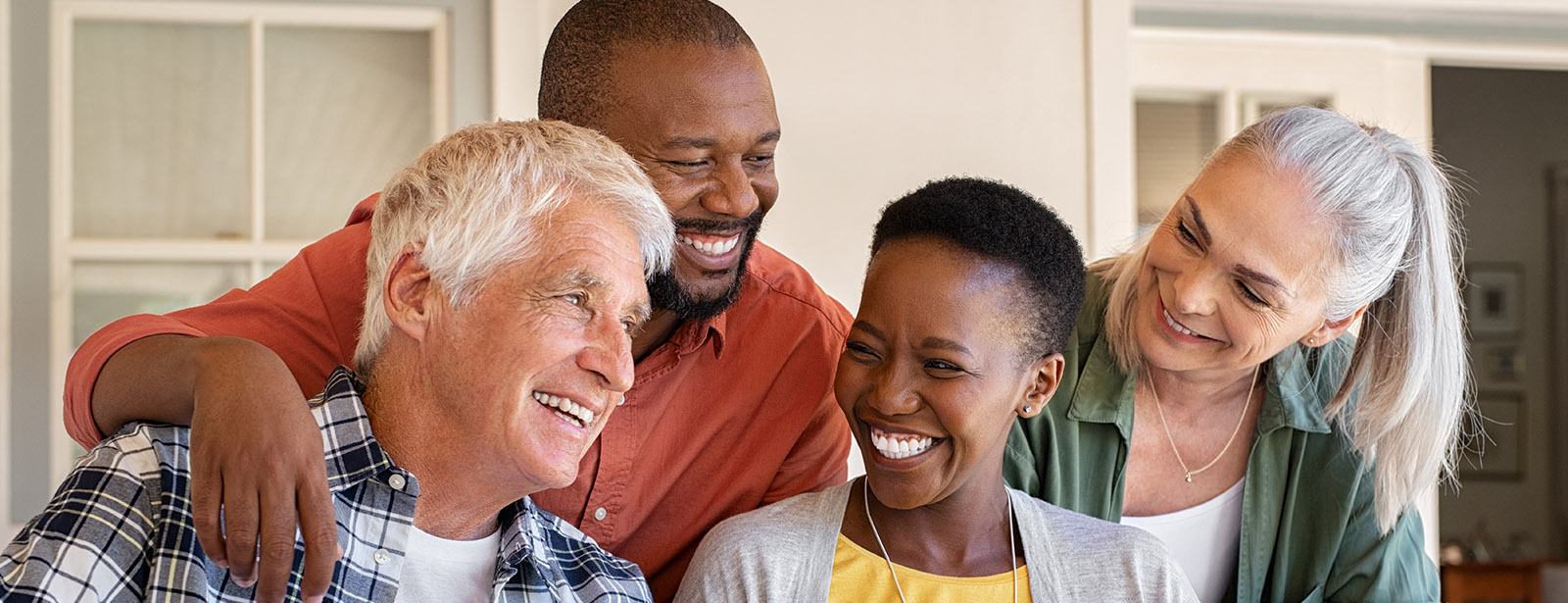 Diverse group of people on porch smiling